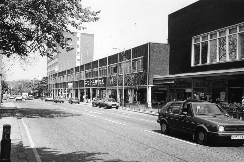  Otley Road looking north-west showing the Arndale Centre running along the right hand side of the road. Shops featured in the photo include Safeway supermarket in the centre and Radio Rentals and Alpaca Yarns towards the right.
