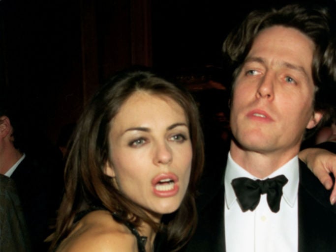 Model Elizabeth Hurley and actor Hugh Grant at the US Vogue party held during London Fashion Week (Photo by Dave Benett/Getty Images).
