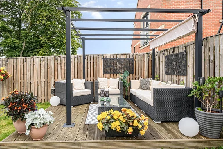 The garden also has a patio and decked seating area with pergola.
