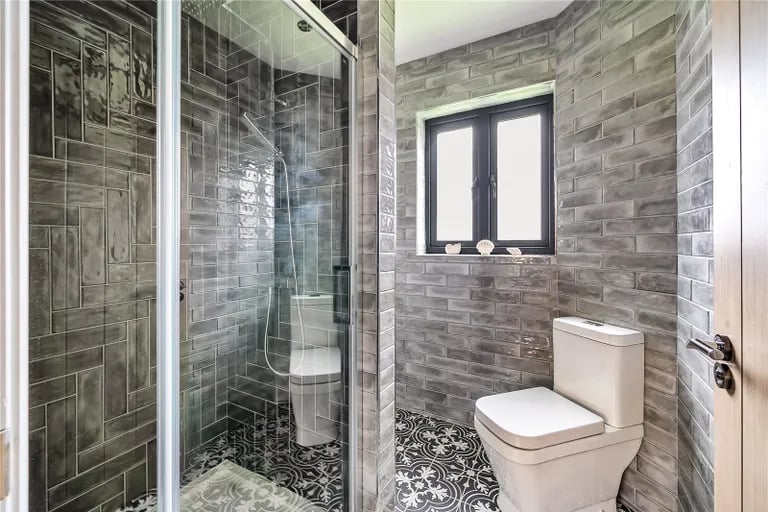Two of the bedrooms have their own gorgeous en-suite shower rooms.
