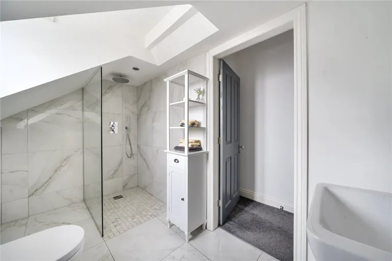 Here is also a gorgeous shower room with skylight window.
