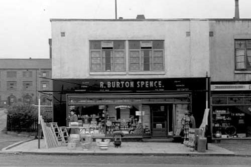 R. Burton-Spence hardware dealer, on the east side of Dewsbury Road. Next to that is Electronic Services at number 388. Pictured in May 1953.