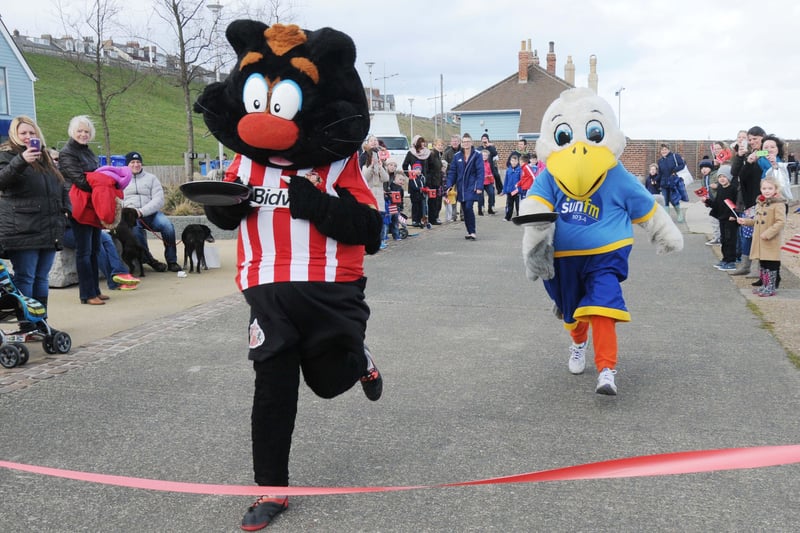 Mascots Samson the Cat and Sunny the Seagull competed in a pancake race along the seafront at Roker in this half term scene from 2019.