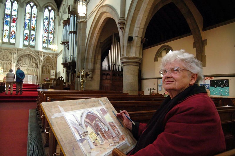 Horsforth Art Club member Val Jennings paints a view of the interior of St Margaret's Chuch during an open day in May 2007.