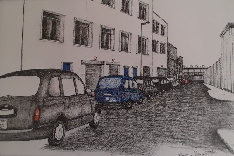 A drawing of taxis parked up outside the ASDA in Birkenhead.
