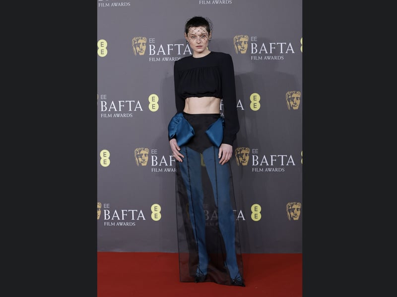 The Crown actor Emma Corrin attends the 2024 Bafta Film Awards. 