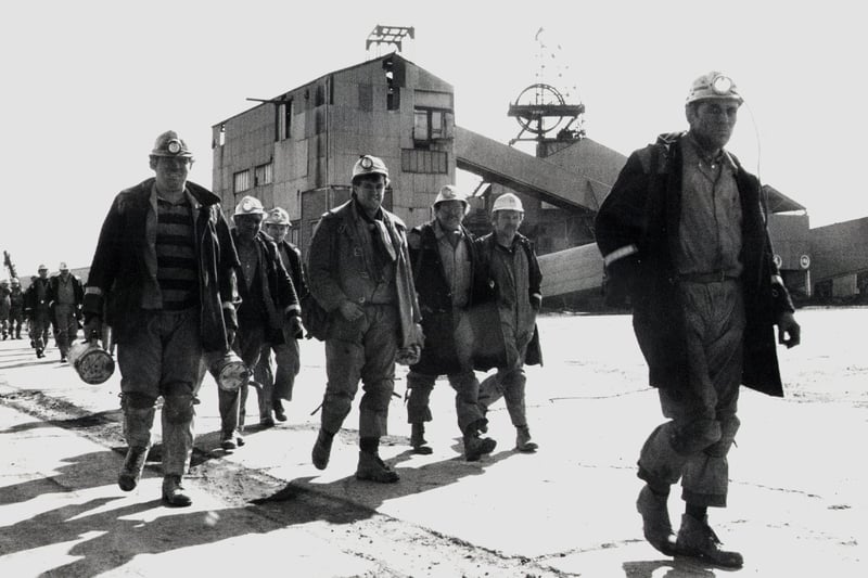 Glasshoughton colliery workers leave the pit head for the last time.