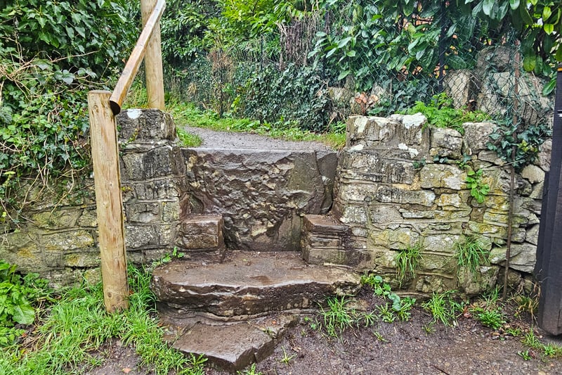The steep step leads to the path to Ty Sculpture Trail from Jacklands Fish Lakes and Farm Shop.