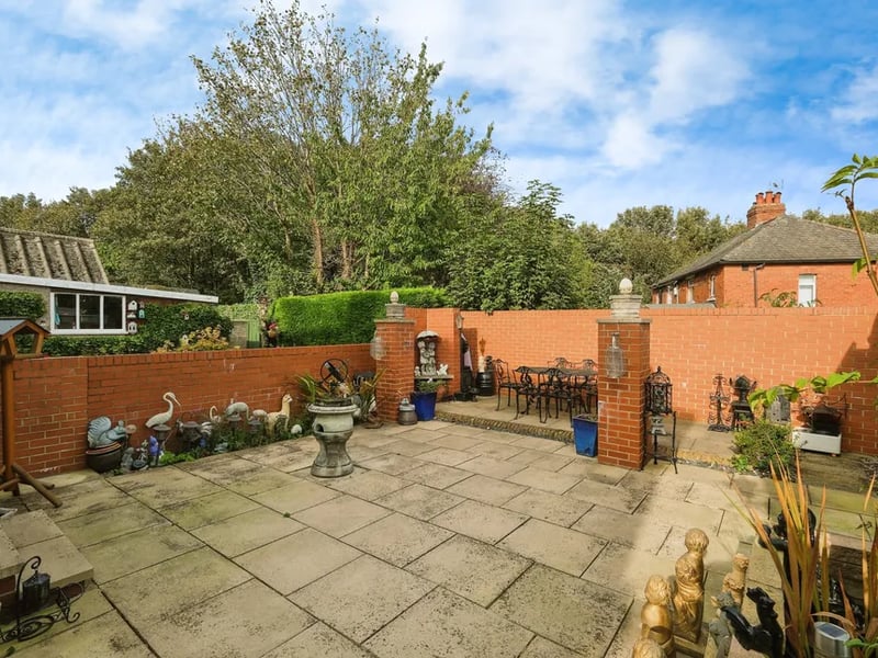 Externally is a delightful low maintenance garden, a driveway with ample space for multiple vehicles and a garage.