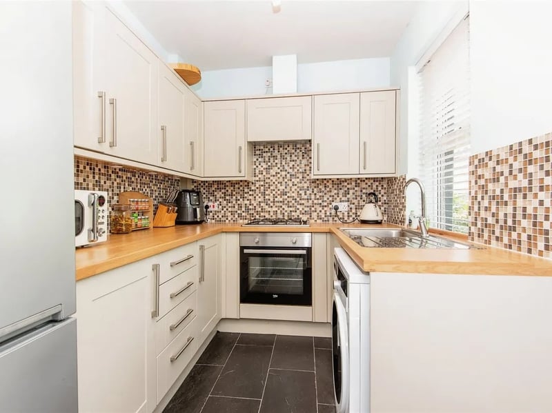 The kitchen is found to the rear of the house, providing access to the garden. (Photo courtesy of Zoopla)