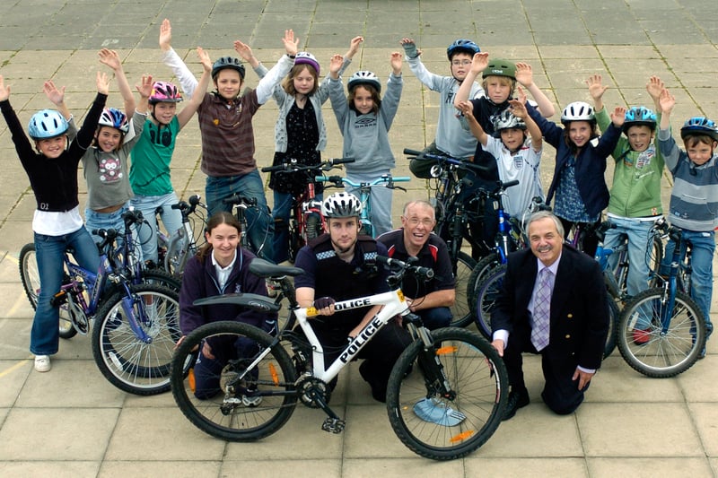 October 2007 and pupils from Newlaithes Primary School took part in an after school activity 'Go-Riding'. Pictured, front left to right, are teacher Catherine Jury, PCSO Liam Ward, GB Professional cyclist Alan Edmundson, and Coun Chris Townsley, with pupils looking on.