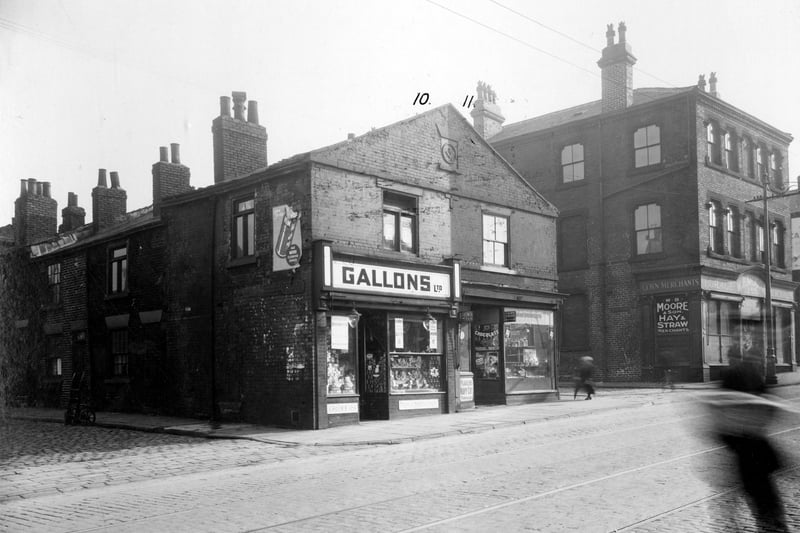 On the left is Vetch Street, branch of Gallons Ltd grocers at no.11, to the right at no.13 sweet shop run by Jabez Barrand. Next is Bean Street. No.15 premises of W.Moore and Son, hay and straw merchants. Pictured in September 1935.