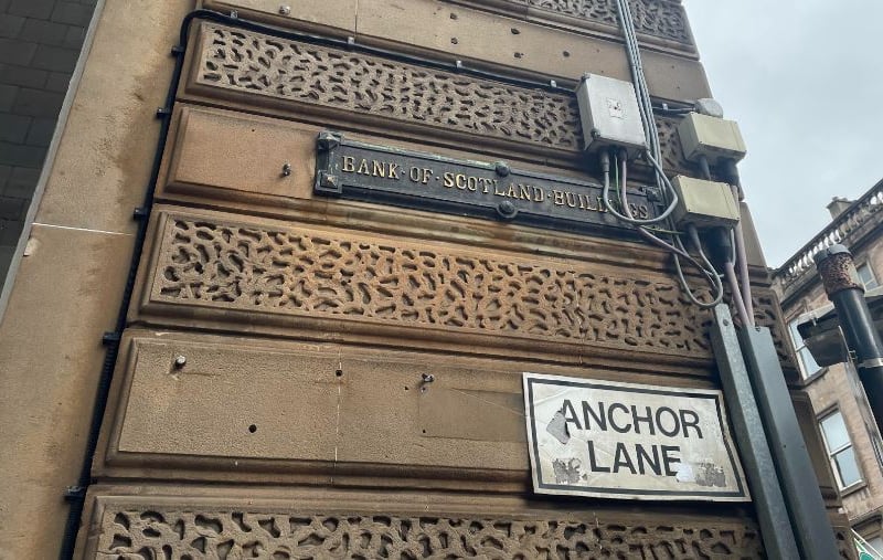 An old Bank of Scotland sign which can be found on Anchor Lane. 