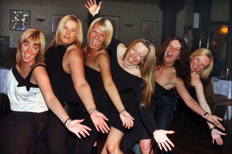 These former workers were having a great time at a staff reunion in December 2004.