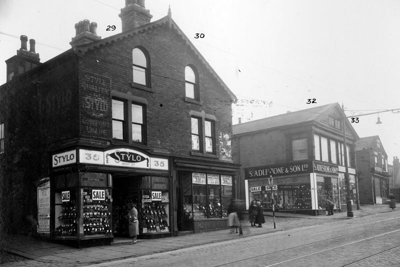 On the left is Apple Street, to the right no.35 Stylo shoe shop, then no.37 Tom Green leather seller. Next junction with Windsor Street no.39 business of S. Adlestone and sons, boot dealers. Pictured in September 1935.