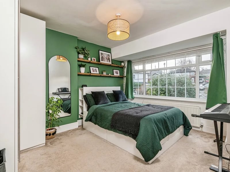 The master bedroom is fully renovated and freshly plastered with built-in wardrobes and large window.