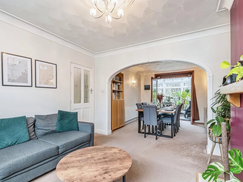 The living room opens up to a spacious dining room.