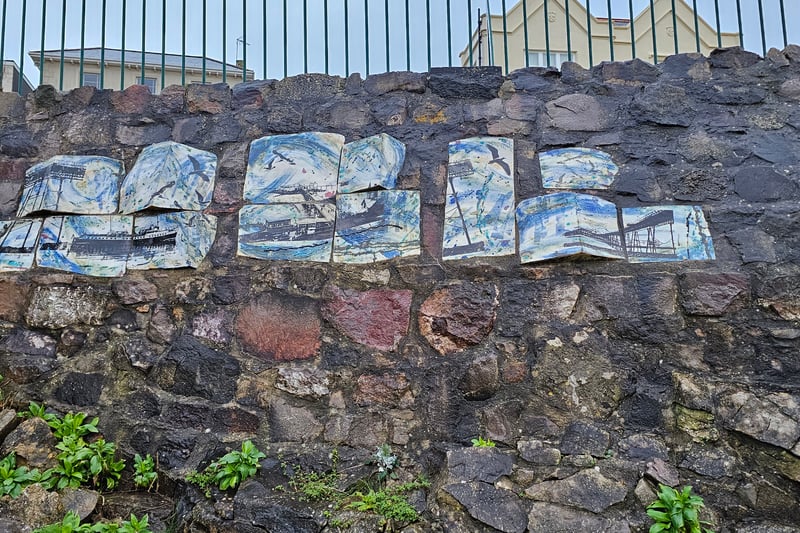 The tiled art piece by the North Entrance was created by local artist Kate Poole.