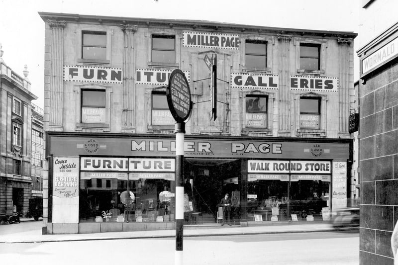 Miller Page furniture store looking from junction of Wormald Row. Shop is at 119 Albion Street. Junction with Upper Fountaine Street can be seen on left. Pictured in August 1939.