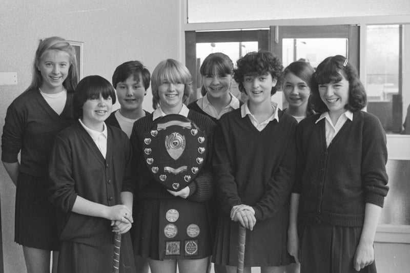 Proudly holding the shield they won 42 years ago is the Thornhill Comprehensive Schools under-16 hockey team. 