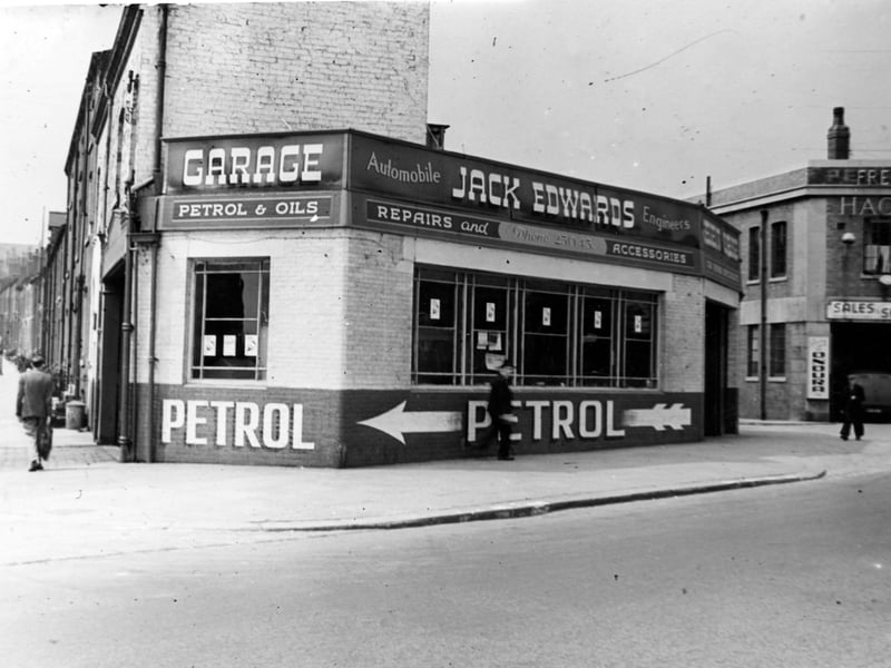 Regent Garage on the corner of Sheepscar Street South and Stamford Street. Hache's Whitelock Garage is visible on the right. People are walking past and the end of Whitelock Street can be seen. Pictured in July 1946.