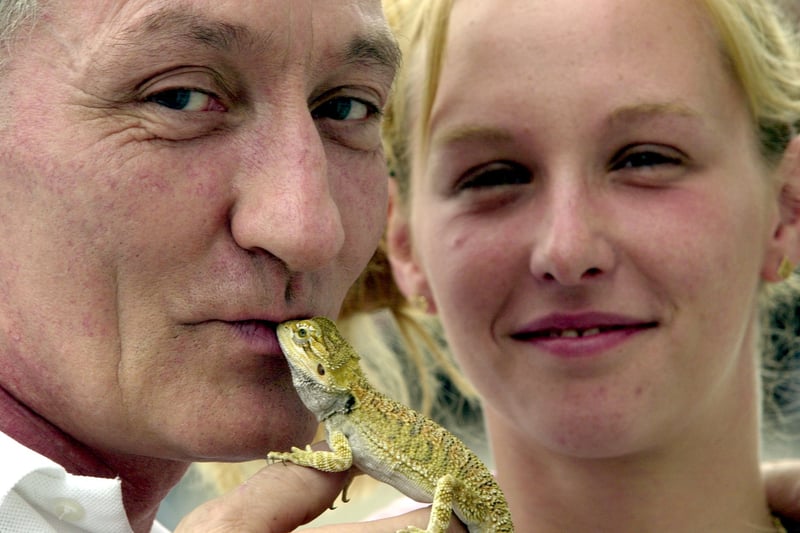 Billy Kirtley, owner of Rothwell Pets and Reptiles Centre, who saved the life of a young Bearded Dragon lizard named Peapod by giving it a kiss of life. Looking on is owner Nicola Slater.