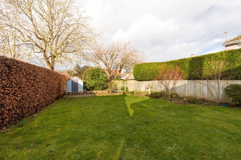 There are well-maintained garden grounds to the front, side and rear of the property, with lawns, mature borders and patio. There is also a garage with up-and-over door, driveway parking and further unrestricted parking in the surrounding streets.