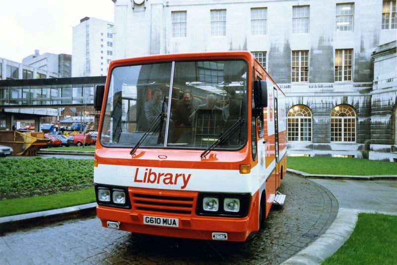 One of Leeds City Libraries' Mobile Libraries on the circular roadway in the grounds to the rear of the Civic Hall, taken when the mobile was new in 1989. The glass bridge linking the Civic Hall to its Annexe can be seen to the left. The tall building partly visible behind this is Leeds College of Technology.