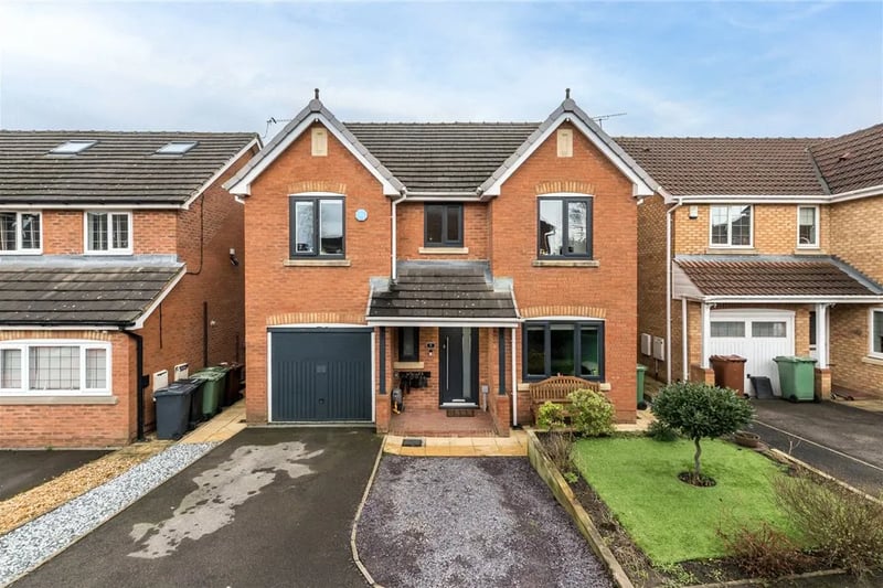 An impressive four-bedroom family home is on the market.