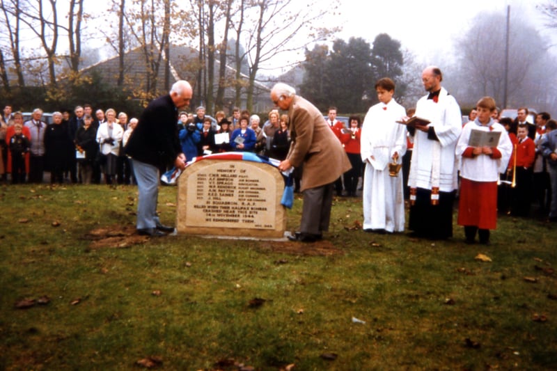 The dedication taking place of the Memorial to the crew of the Halifax Bomber which crashed close by on Bradford Road. It occurred on Thorpe Lane on  November 14, 1944 and it was witnessed by the a then 14-year-old Walter Townend, a student at Morley Grammar School. The seven crewmen were all killed. Walter was determined to get a memorial erected for these men and this occurred in 1989 in the presence of some of the relatives of the dead airmen. 