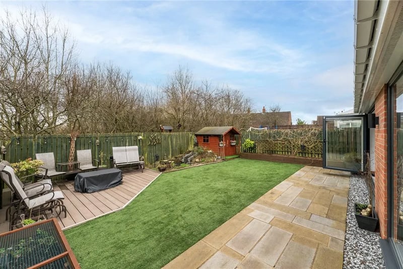 To the rear is a spacious garden ideal for families.