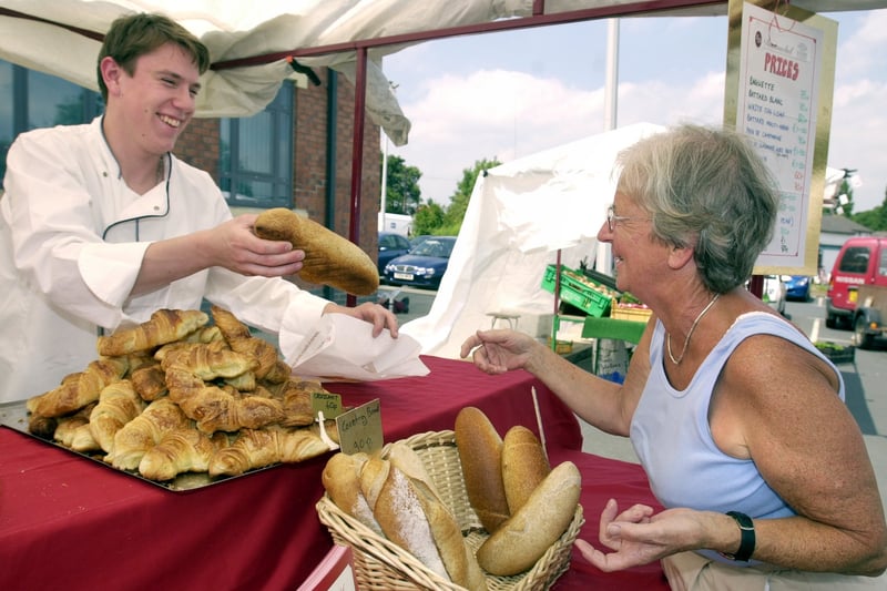 Anthony Lecaude from  Dumouchel bakery in Garforth sells French bread at the Farmers market in Rothwell in October 2003.