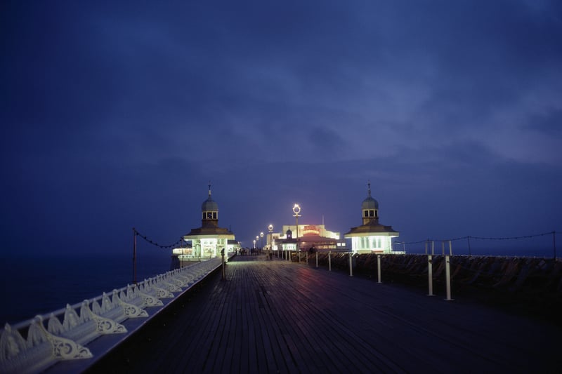 A night view of the illuminated pier in the seaside resort of Blackpool, Lancashire, August 1983. (Photo by RDImages/Epics/Getty Images)