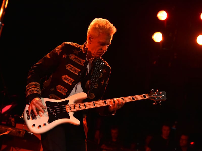U2 bass guitarist can't compete with his lead singer when it comes to his bank balance, but Adam Clayton is still worth a pretty healthy $400 million or thereabouts.