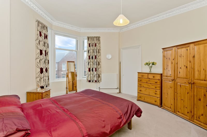 The principal bedroom is a large double, which boasts a press cupboard and a bay window.