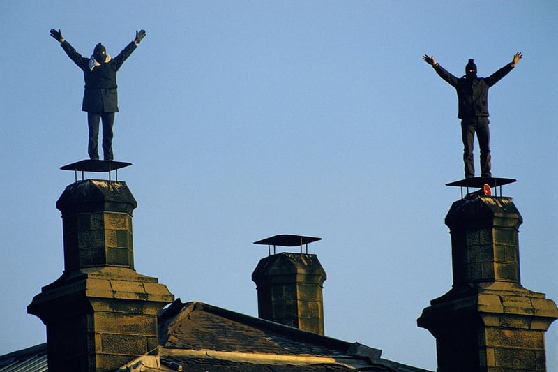 Prisoners demonstrate about poor conditions on the roof of Barlinnie Prison in Glasgow in 1990. 