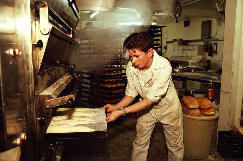 Picture shows a man baking bread in the early hours of the morning in a Glasgow bakery in March 1990.