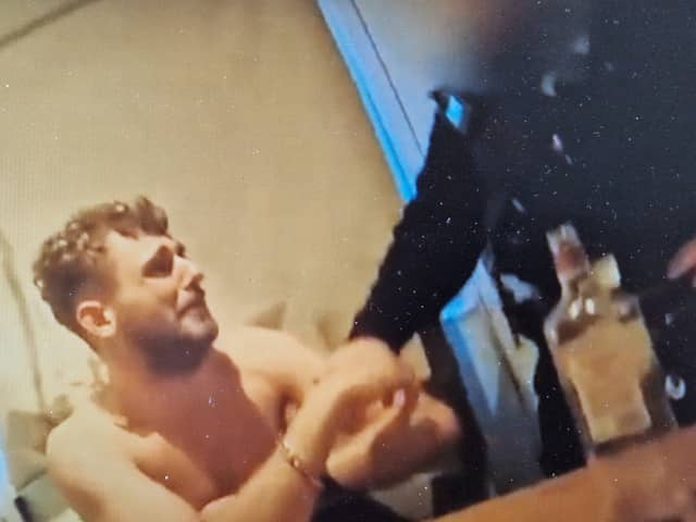 Video shows Jordan Jackson breaking down in tears after police catch him throwing drugs over a fence at a house in Barnsley. Picture: South Yorkshire Police