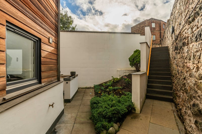 Exterior: Unusually for a city-centre property, this home features a rear paved seating area, which is easy to maintain and bordered by hedges.
Contact Neilsons