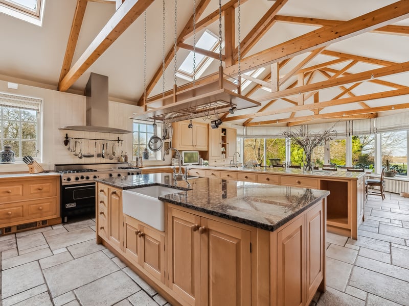 The bright and airy kitchen at Waterside Farm on Fingalton Road is an ideal space for entertaining and has ample room for a large dining table to seat the entire family plus friends.