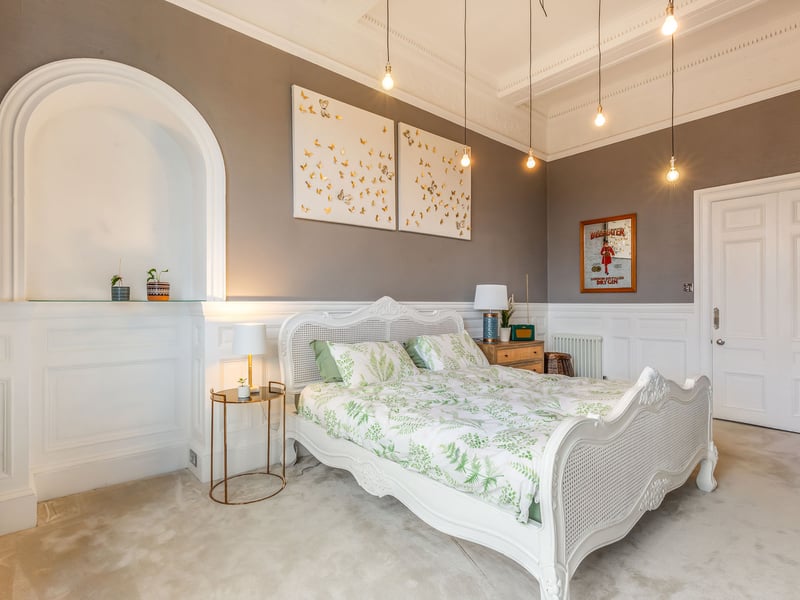 Interior: Victorian features abound throughout the host building, and the apartment has been brought up to an excellent contemporary standard in its sleek kitchen, dual-aspect lounge, and sizable double bedroom.