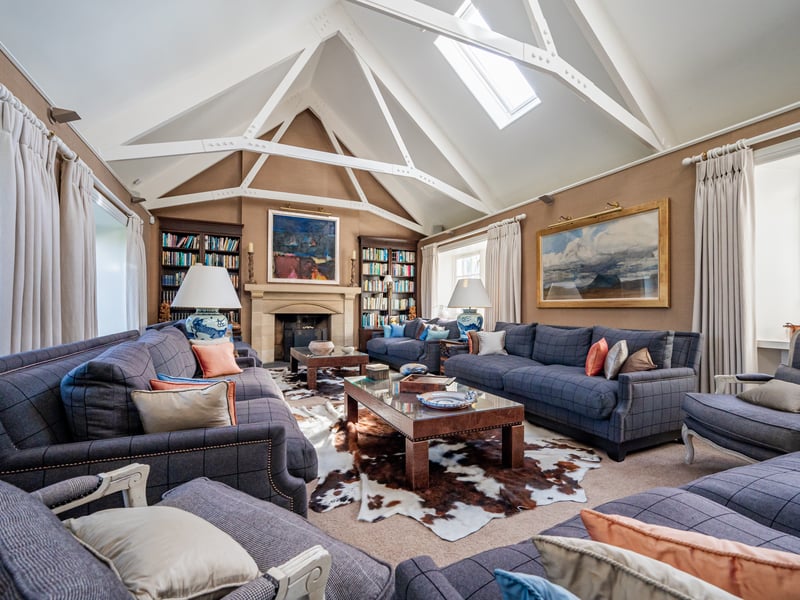 The property was built on the site of a former farmhouse and stands as a generously-proportioned home, with more than 11,000sq ft space, and has been decorated to an exceptional standard, thanks to the efforts of its owner, Linda Reid, who happens to be an interior designer.
She recalls several attempts at purchasing the original house after she and her husband, Eric, had been left awestruck at the location. Linda recalls: “We tried to buy it about
29 years ago, but the owner never turned up each time, so after three attempts we gave up.
“In the end, he had been away and came back to see all the pipes had burst in the house, so he phoned us up. It had been a disaster because it had been completely flooded and it was like a ruin.
“We rebuilt it and extended it on all sides, so it is partly a new house and partly an old house.”
