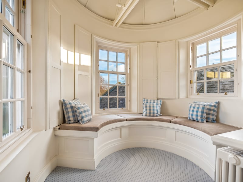The turret of Waterside Farm provides a cosy nook, ideal for reading in
