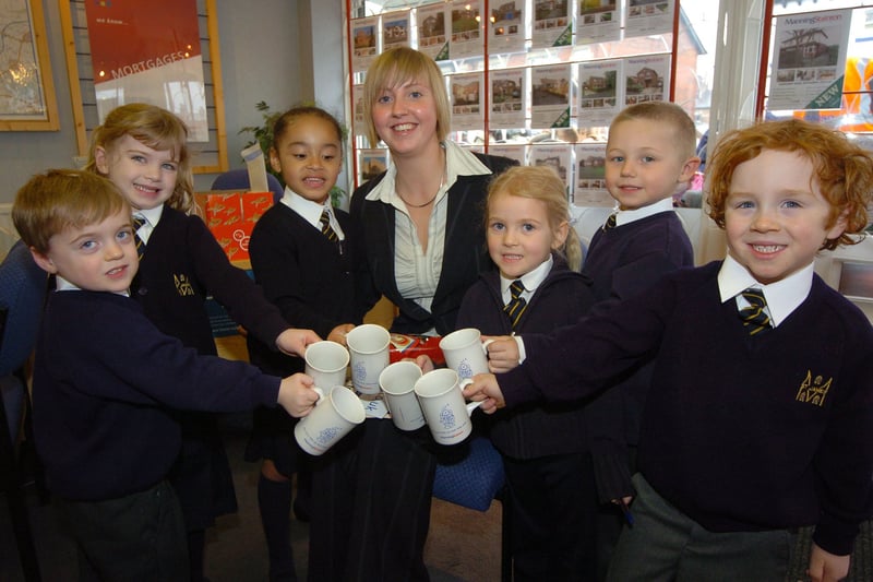 Pupils from Manston St James C of E Primary visited Manning Stainton's Crossgates branch as part of a project on "houses and homes".  Pictured in May 2006 are, from left, Daniel Neal, Holly Wetherill, Savannah Teale, Natalie Waterhouse, Dane Mason and Benjamin StottwithManning Stainton sales negotiator Nikki Walker.