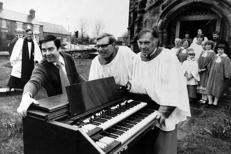 A licensee was pulling out all the stops in April 1979 to help the village church opposite his public house at Worsbrough. The organ as St. Mary's Church is being renovated and the job may take three months to complete. Brian Bingham 
 heard that a piano would have to be used for services, weddings and funerals and made an offer - the church could borrow the electronic organ used in his public house. Mr. Bingham gets help moving the organ after a service.