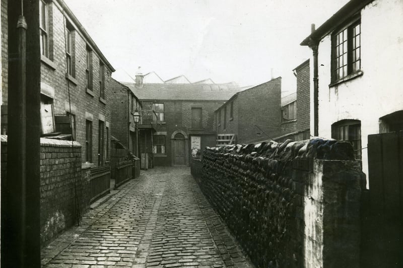Wilkinson's Yard, off Bonny Street, can be seen near the centre of the section enlarged from the original photograph of Central Station (in the archive)
The V shaped roofs of Central Station can be seen above the property at the end of the yard.
These old streets can be seen in the triangular area between the Promenade and the Central Station platforms in the aerial view of Central Station