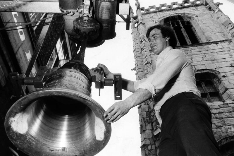 June 1979 and the captain of York Minster bell-ringers, David Potter, gives a guiding hand to Our George, an 'owd lad' from Halifax with plenty of brass, but a slight weight problem. The ten cwt. tenor bell was given originally by  George Taylor Ramsden of Illingworth near Halifax, to his local church. St. Mary's in 1936.
