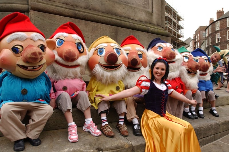 Snow White had plenty of company for this Gala Theatre panto preview in Durham Market Place in 2004.