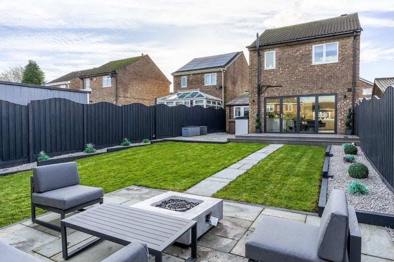 The rear garden is perfect for summertime entertaining.