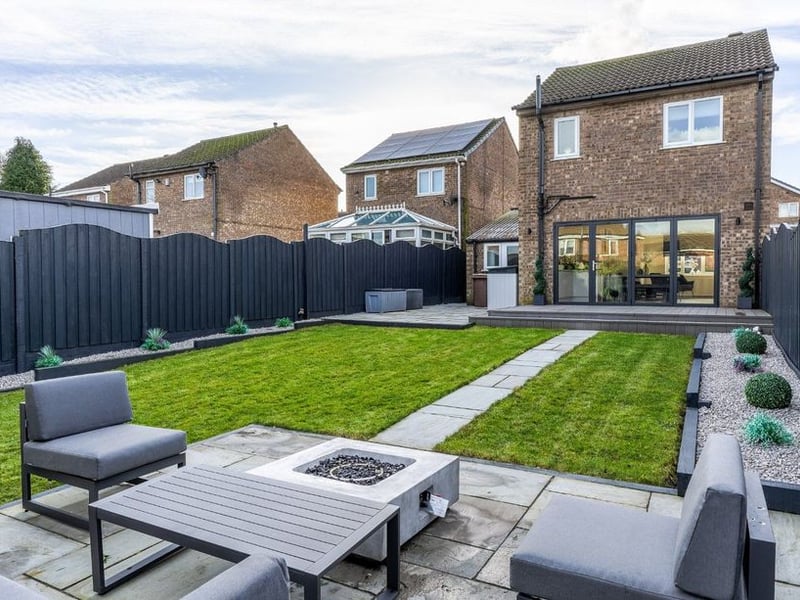 The rear garden is perfect for summertime entertaining.